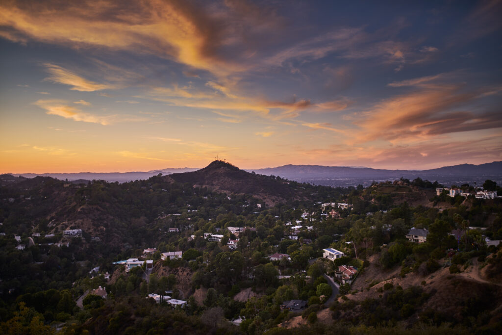 hollywood hills at dusk with colorful sky