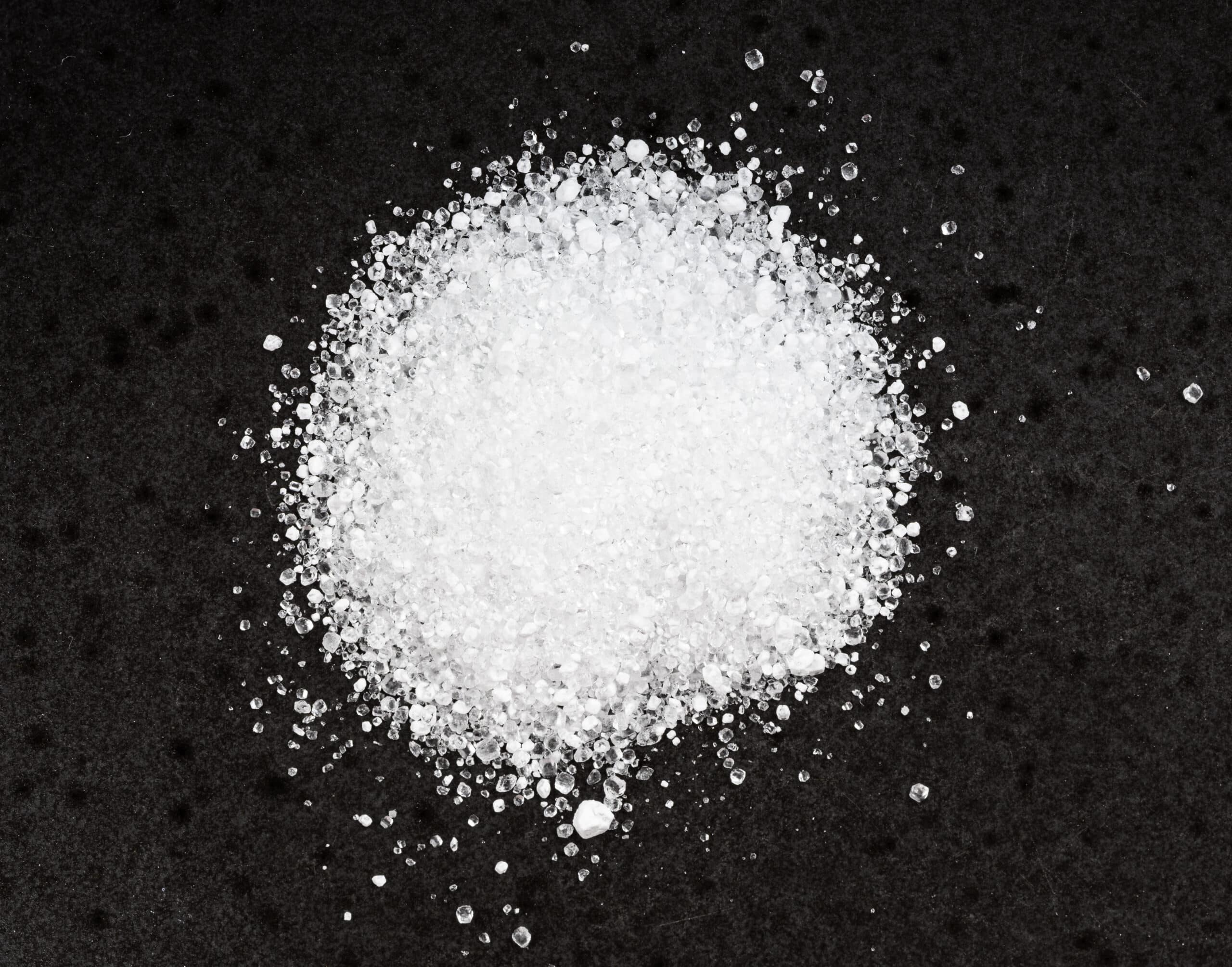 pile of crystalline citric acid close up on black 2024 10 16 21 24 48 utc scaled